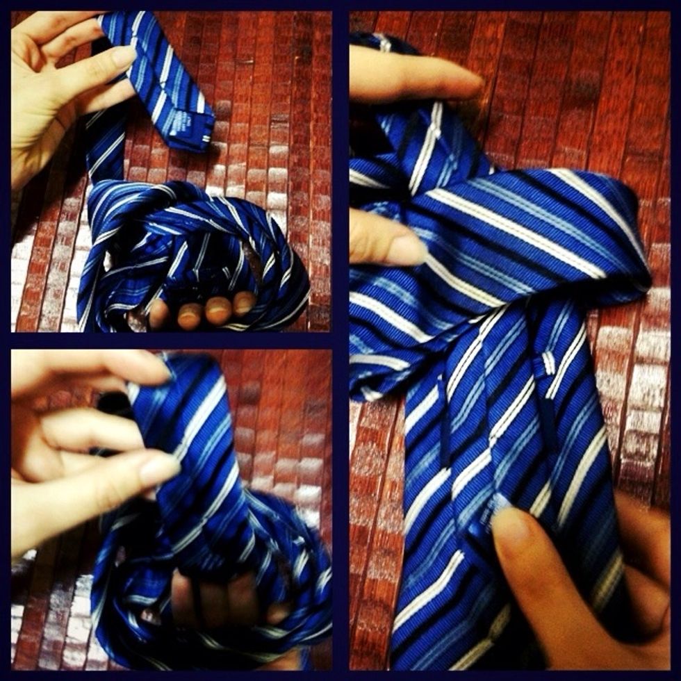 Take the small end of tie and still fit it to a circle, pressure it with finger well on part of the tie.