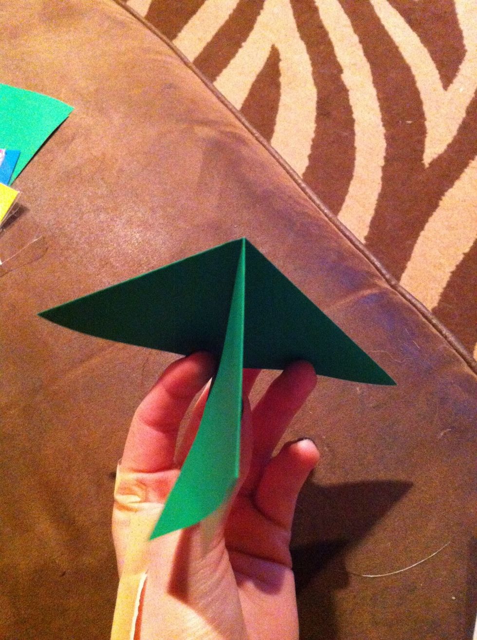 Take the square that's left (shown halfway flipped) and move it to the other side