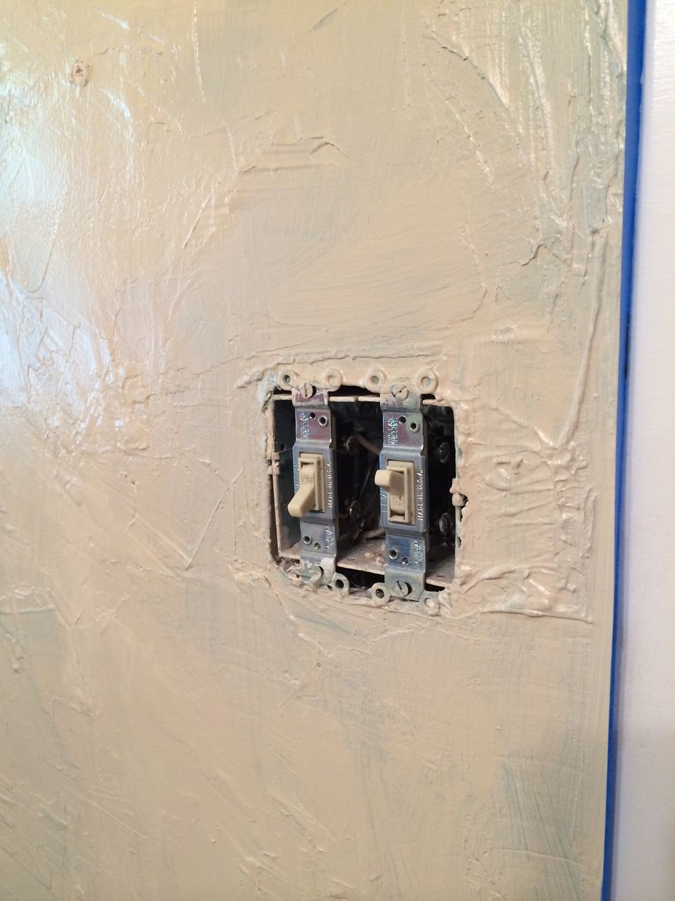 Take the switch plate off the light switch and outlets. It is so worth that extra minute!