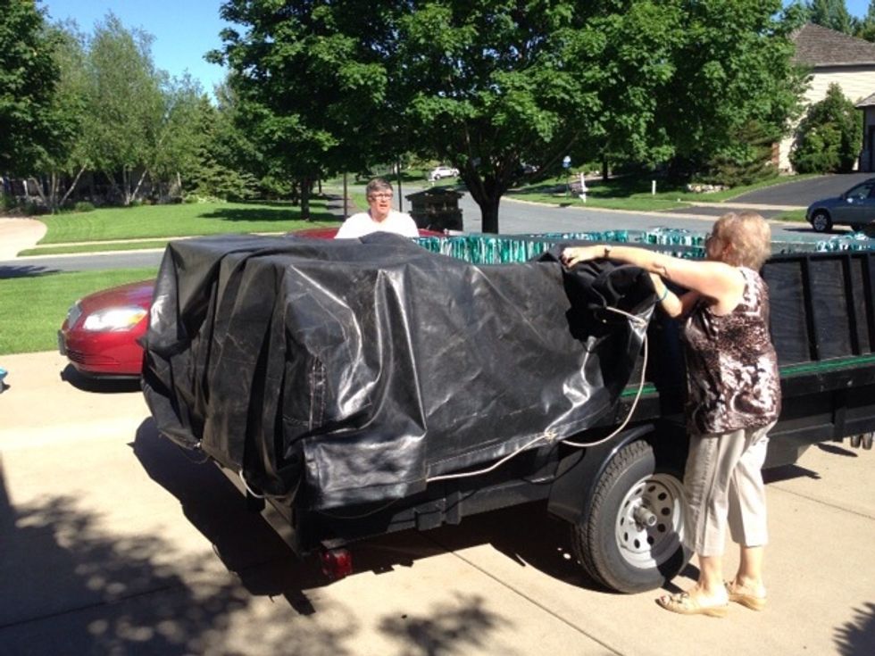 Take the tarp, and unroll it back on top of the float.