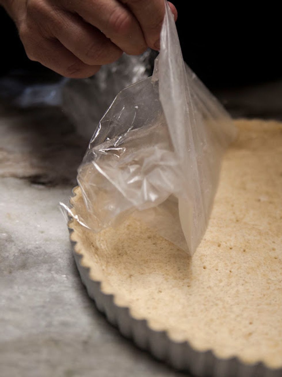 Take the tart shell out, peel off the plastic wrap ...ready for filling