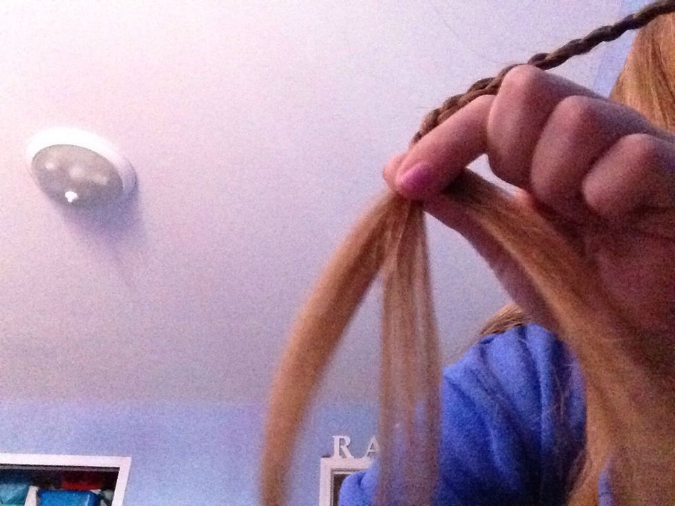 Take the three sections and pull the two ones on the outside together