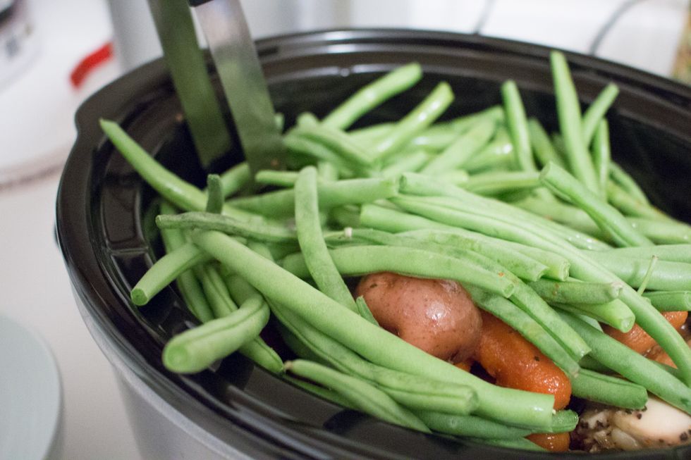 Take the tongs and mix thoroughly.