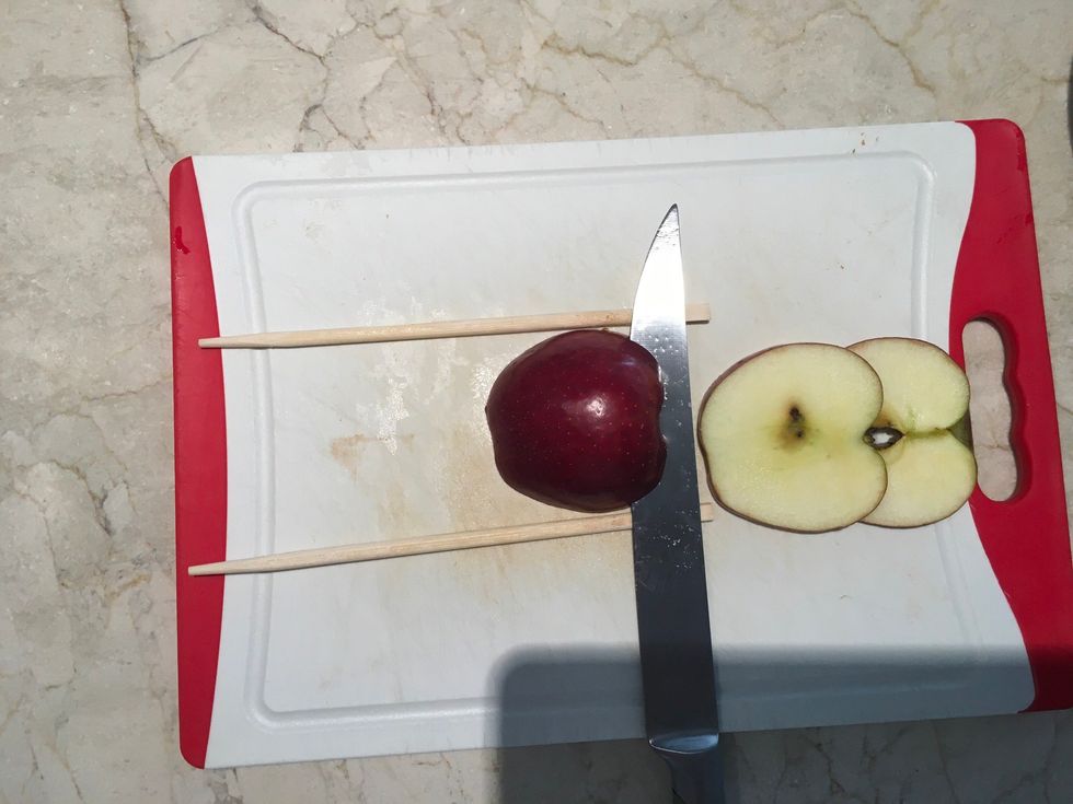 Take the top half of the apple and slice it like the photo