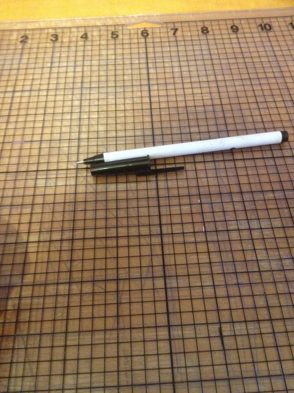 Take the top off the pen first