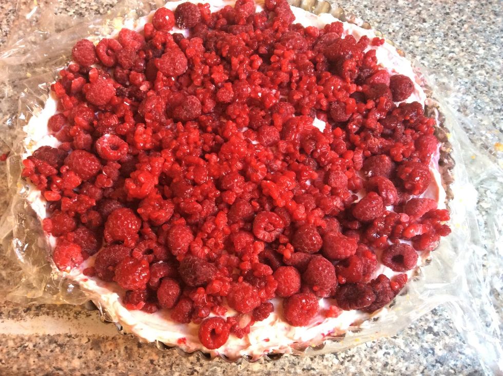 Take the tray out of the fridge and spoon the mixture on to the pasta then top with the remaining raspberries