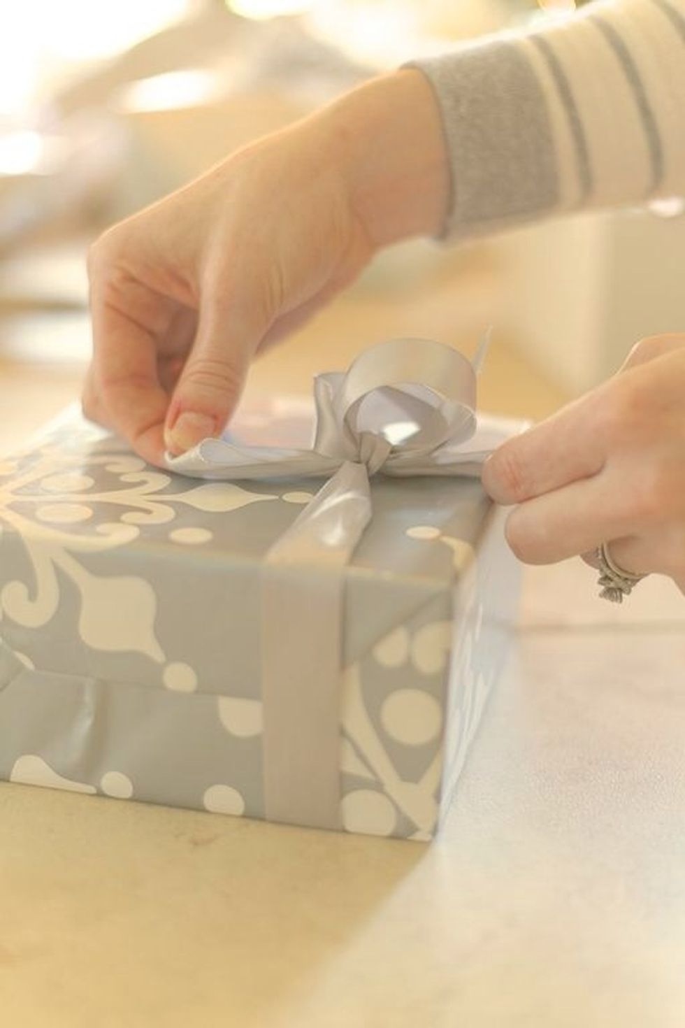 Take the two beginning ears and tighten like you would shoe laces... Pulling the top of one ear and the bottom of another usually works. Make sure it is tight.