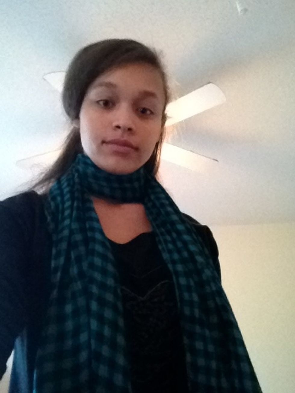 Take the two ends and cross them over one another at the back and bring them back to the front. You can stop here and wear your scarf like this...