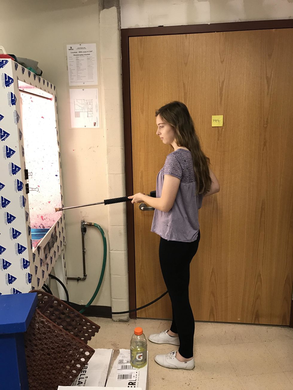 Take the vellum off and blow the screen out by spraying it with water . Let it sit for three minutes and then continue to wash it out without using pressure.