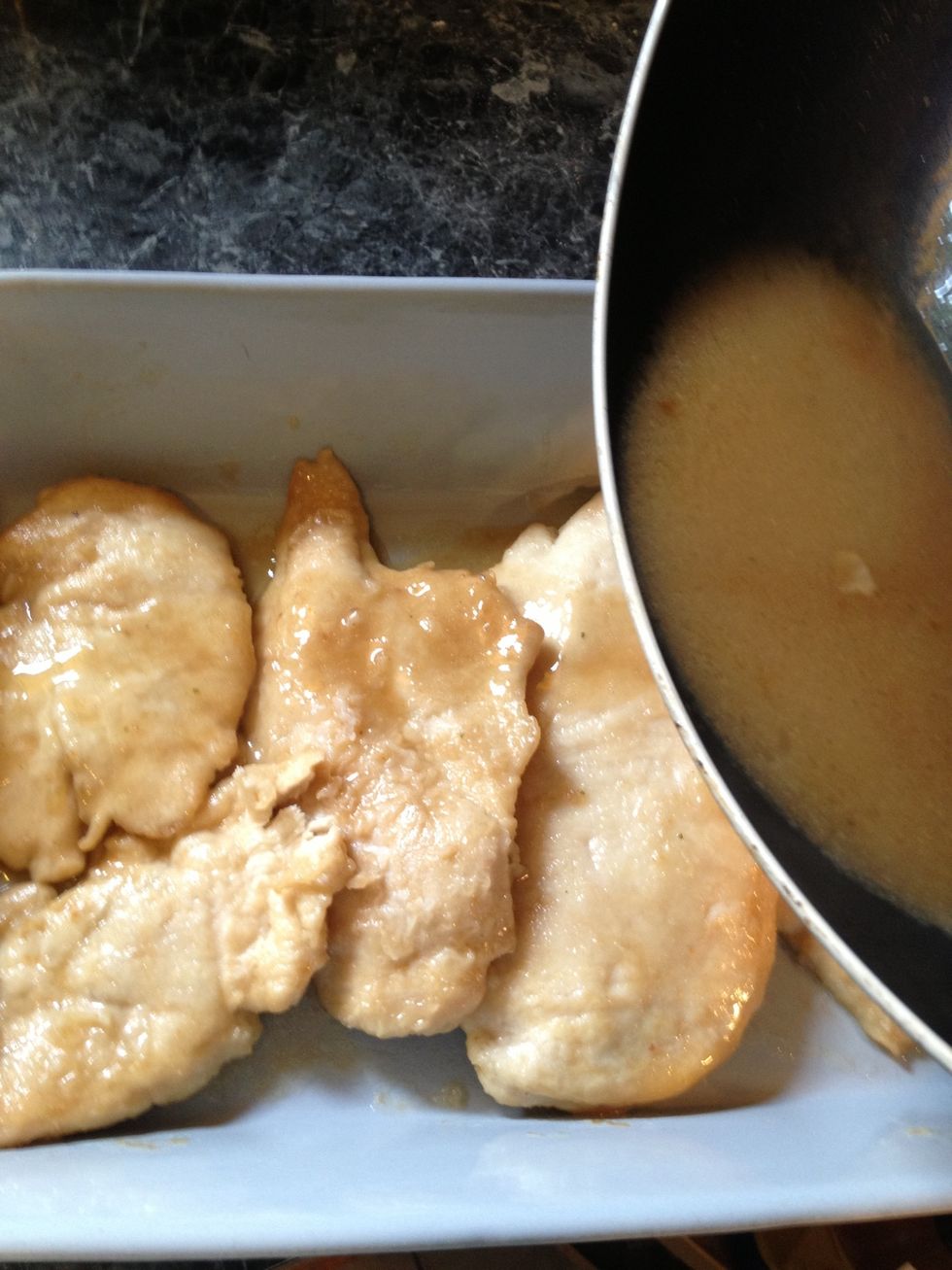 Take the warm sauce and pour it over the chicken.