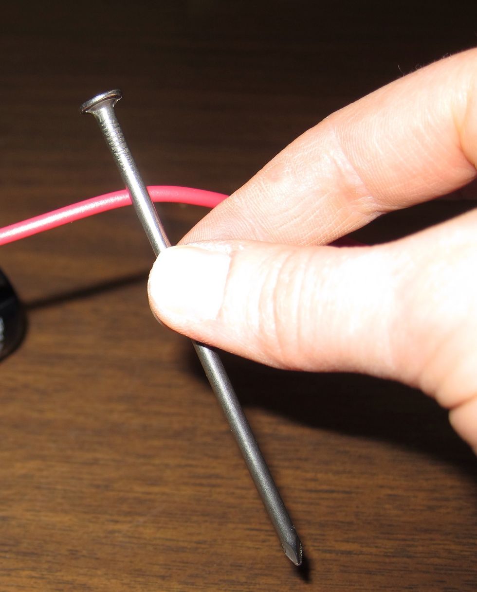 Take the wire and a large nail.