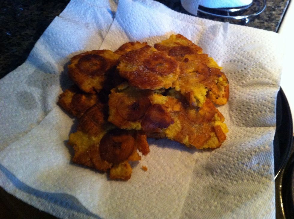 Take them out of the oil onto a paper towel covered plate and salt them while they're still hot. Let cool down some to eat :)