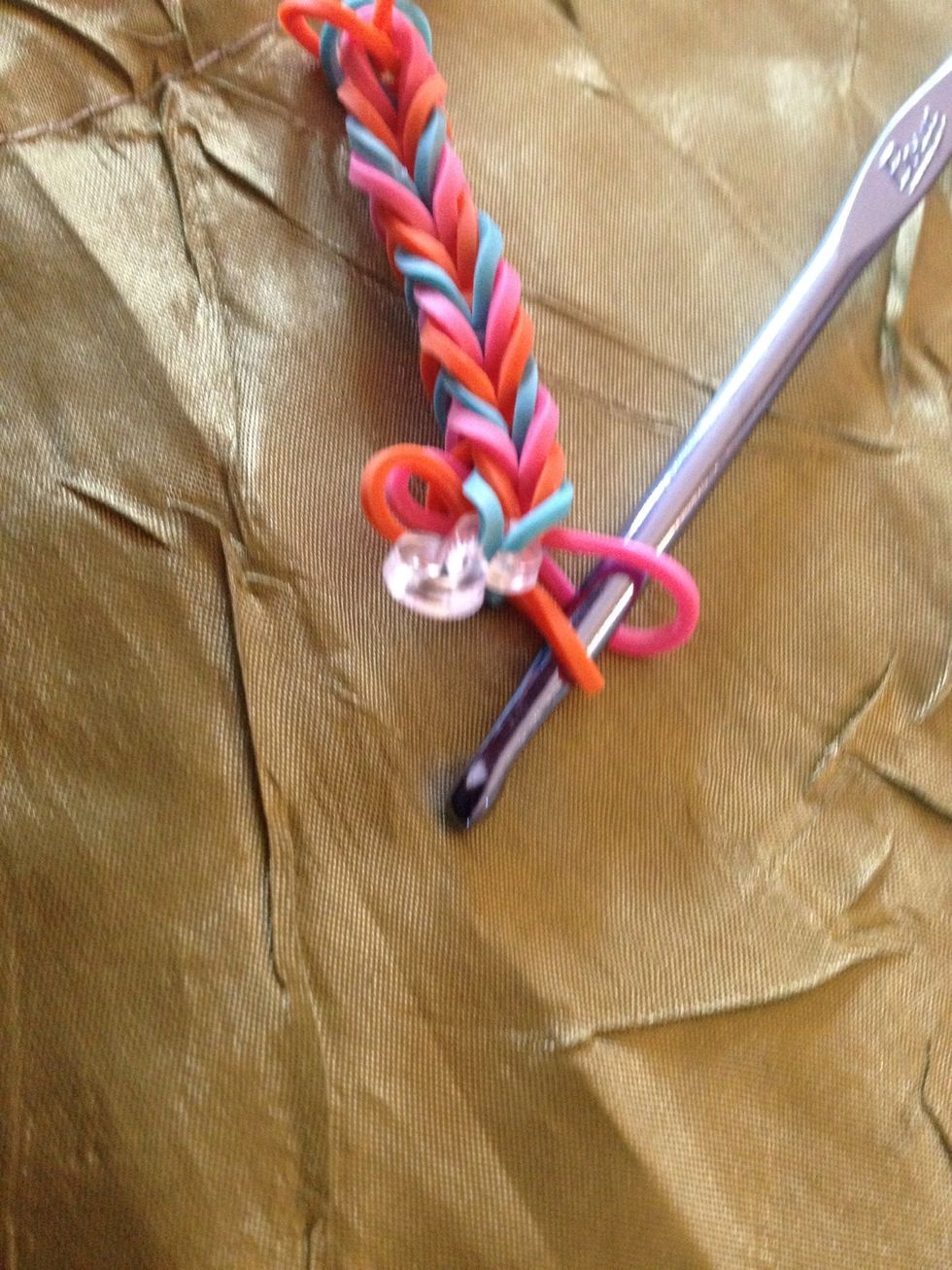 Take these two bands (you don't have to use your hook, I'm just showing you the bands)