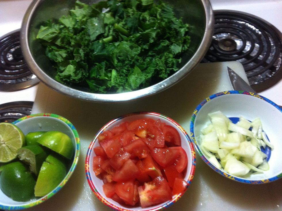 Take time to cut/prep everything. Cube your onions, tomatoes, and and cut you limes. Take some Kale aside and chop it up like >>>