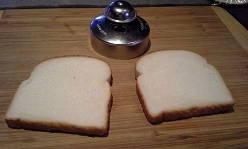 Take two pieces of thin sliced bread