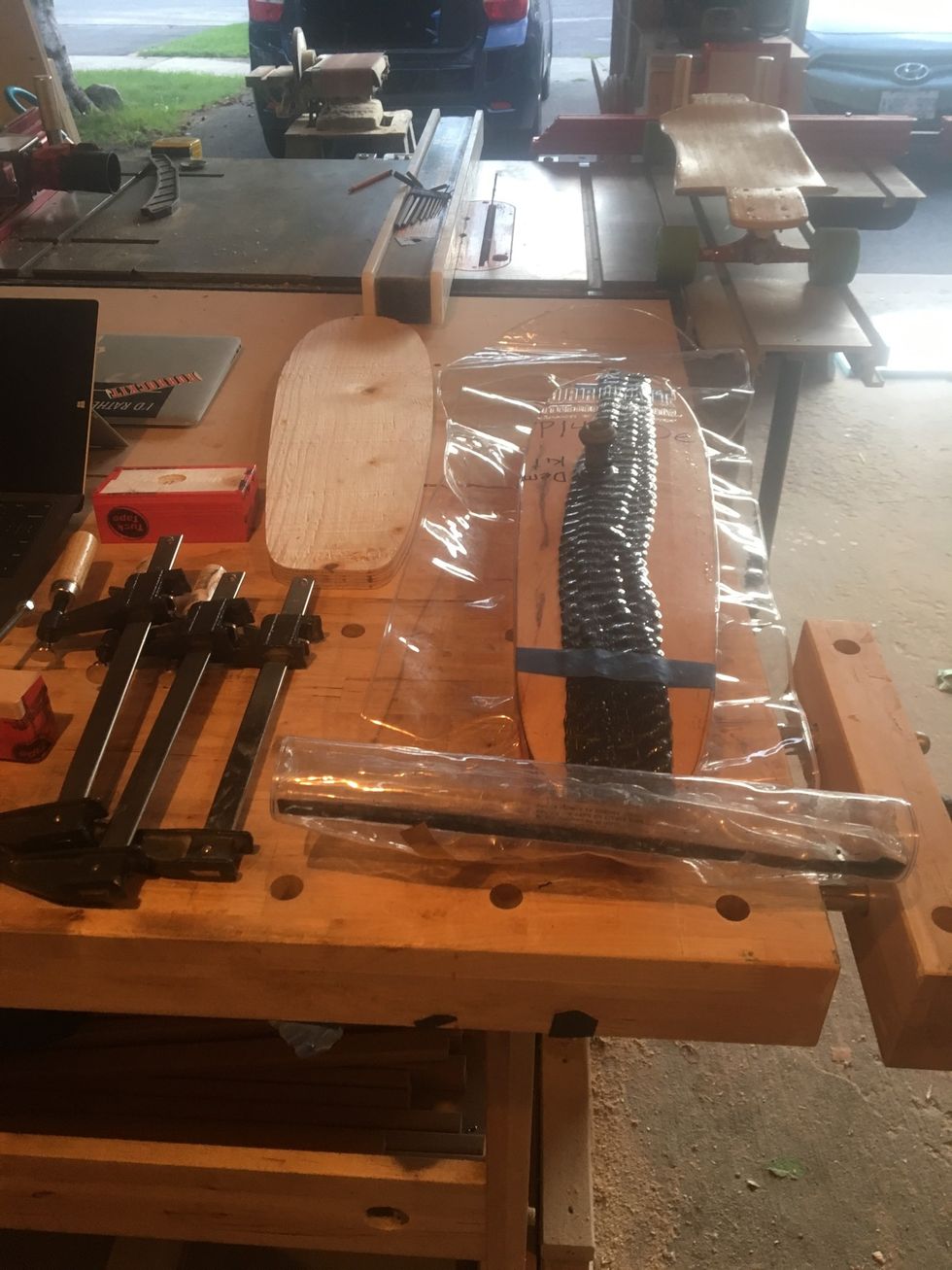 Take vacuum bag off plywood clamping base.