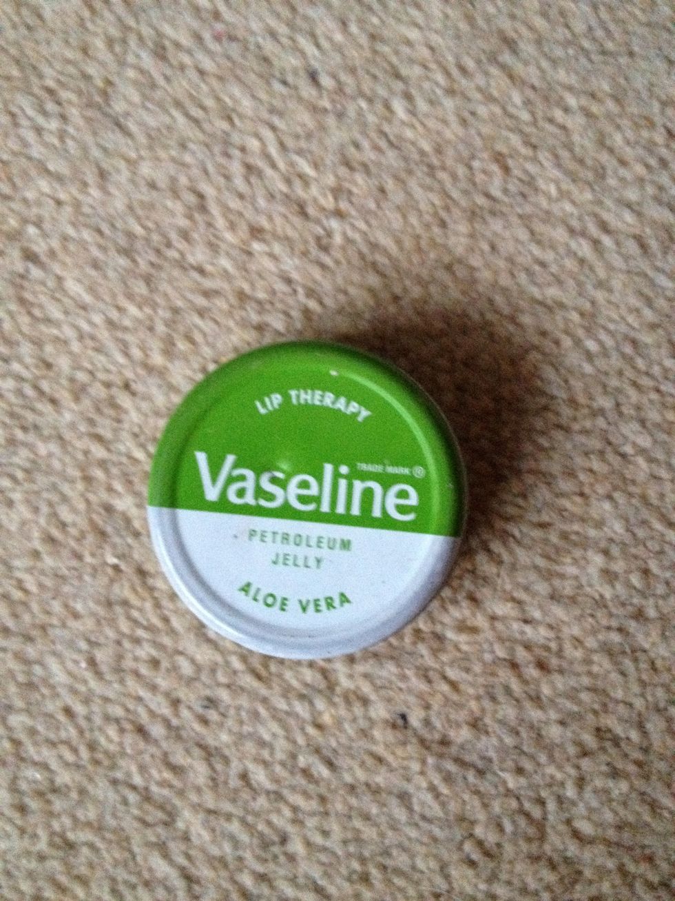 Take Vaseline and smear it generously around your eyebrow, this will protect your skin from staining if the dye drips.