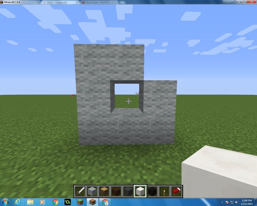 Take your 7 Light Grey Wool Blocks and make this square, but leave the middle square open and the top right open too.