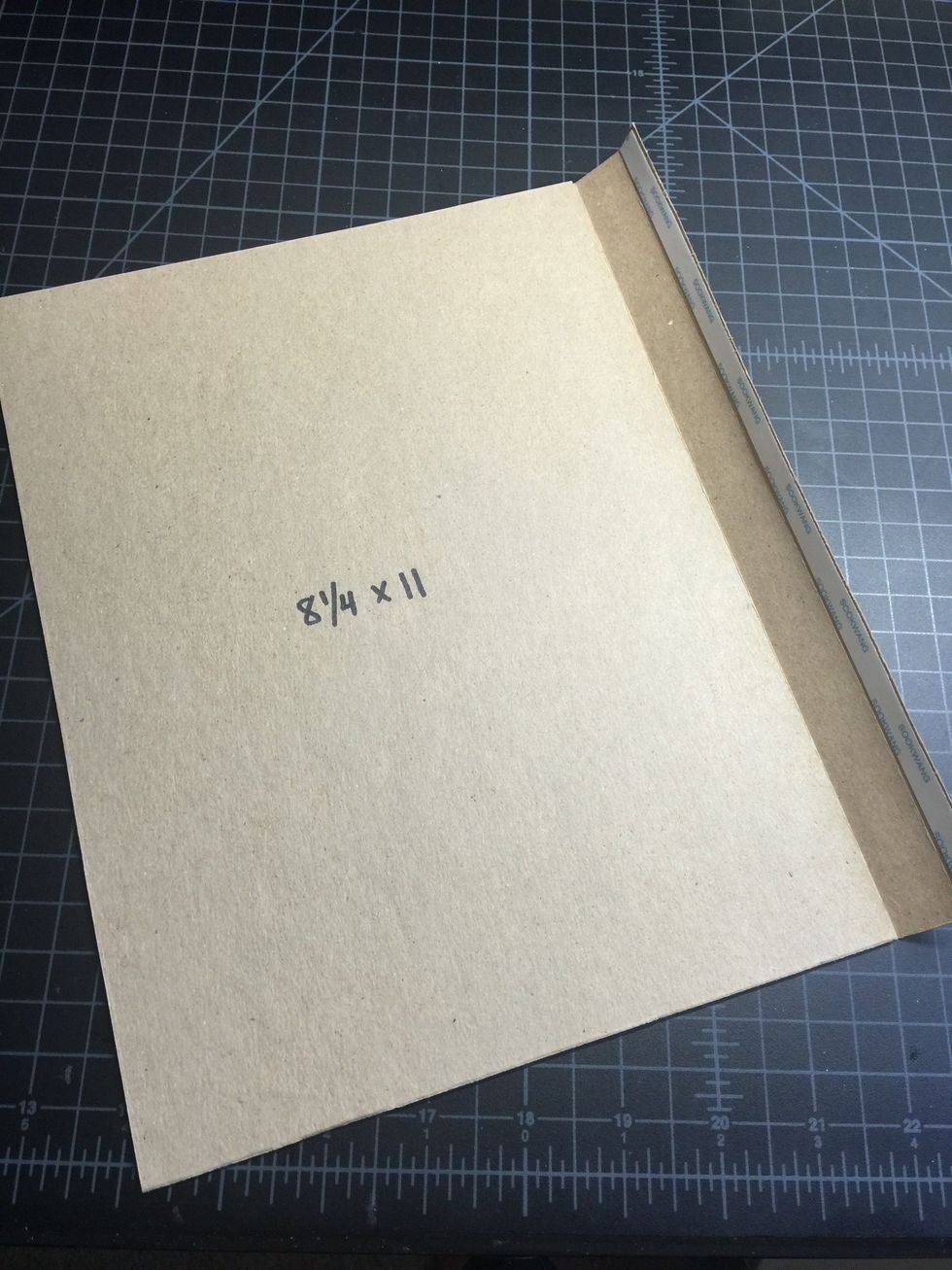 Take your 8 1/4" x 11" piece of chipboard, adhere one of the hinges as shown here.