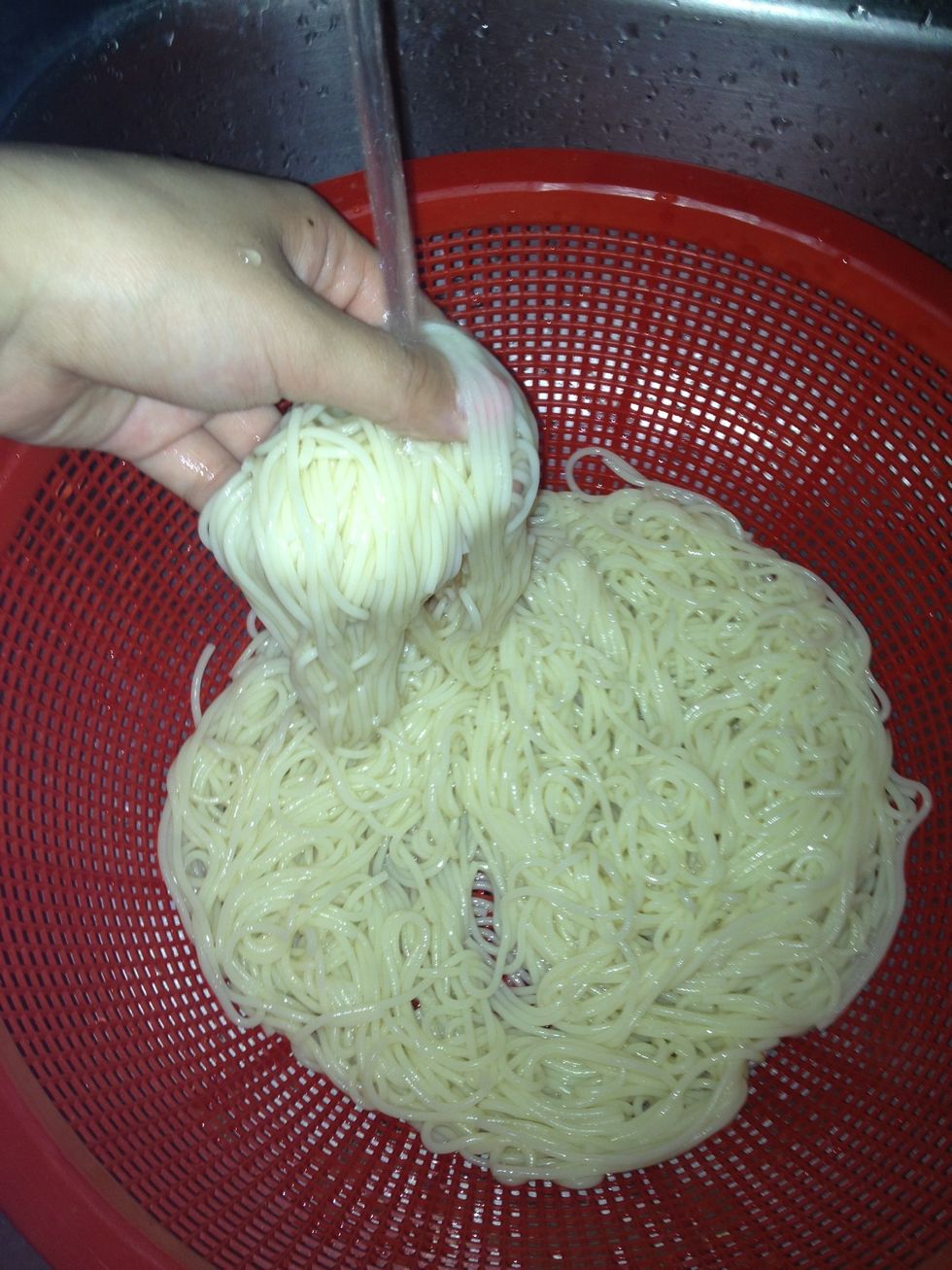 Take your angel hair pasta out, drain, & rinse with cold water. Remember to shake & shake to get rid of the excess water! \ud83d\ude09