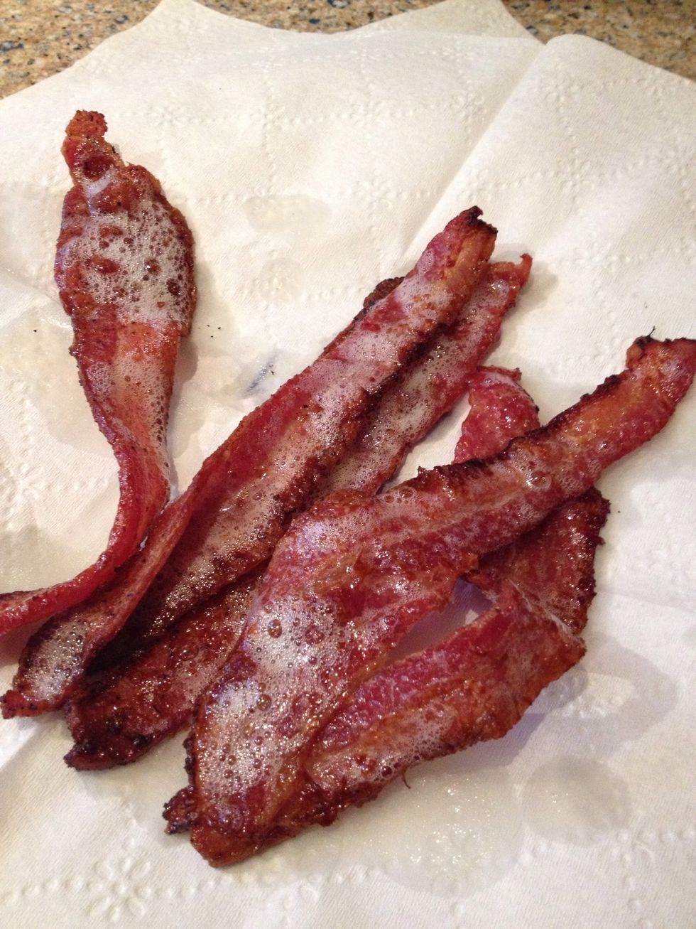 Take your bacon and lay it onto some napkins or whatever to soak up any grease and set aside for now \ud83d\ude09