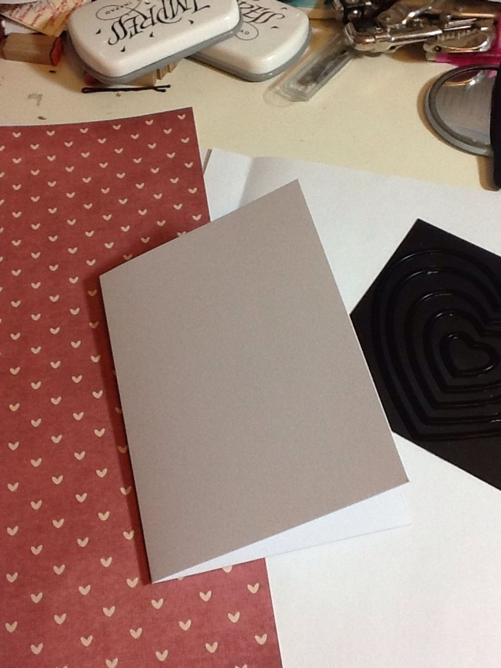 Take your base card, two sheets of patterned (mine is double sided!) and your heart dies (I'm using xcut nesting dies)