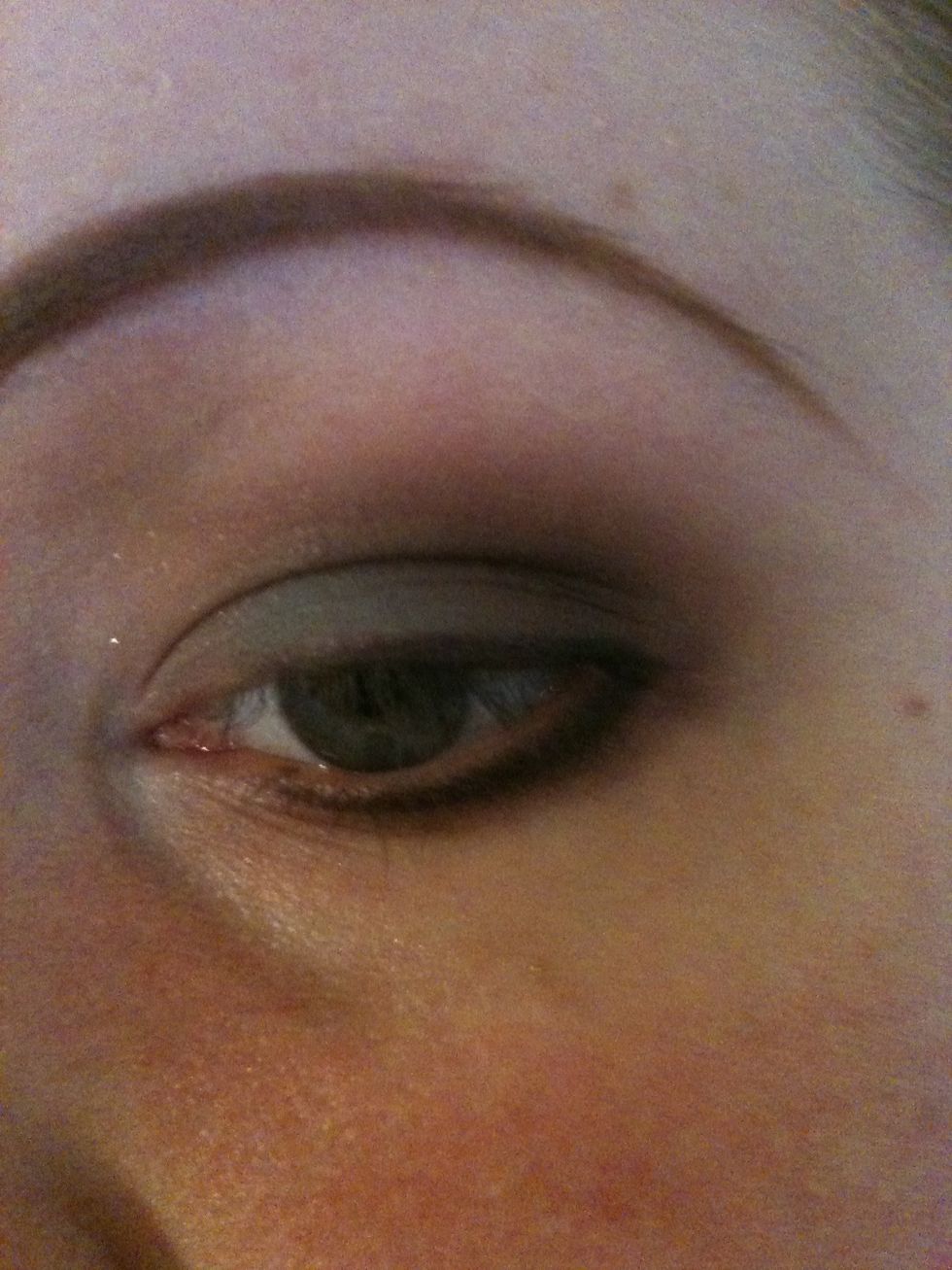 Take your black shadow and line the top lid and lower lid.