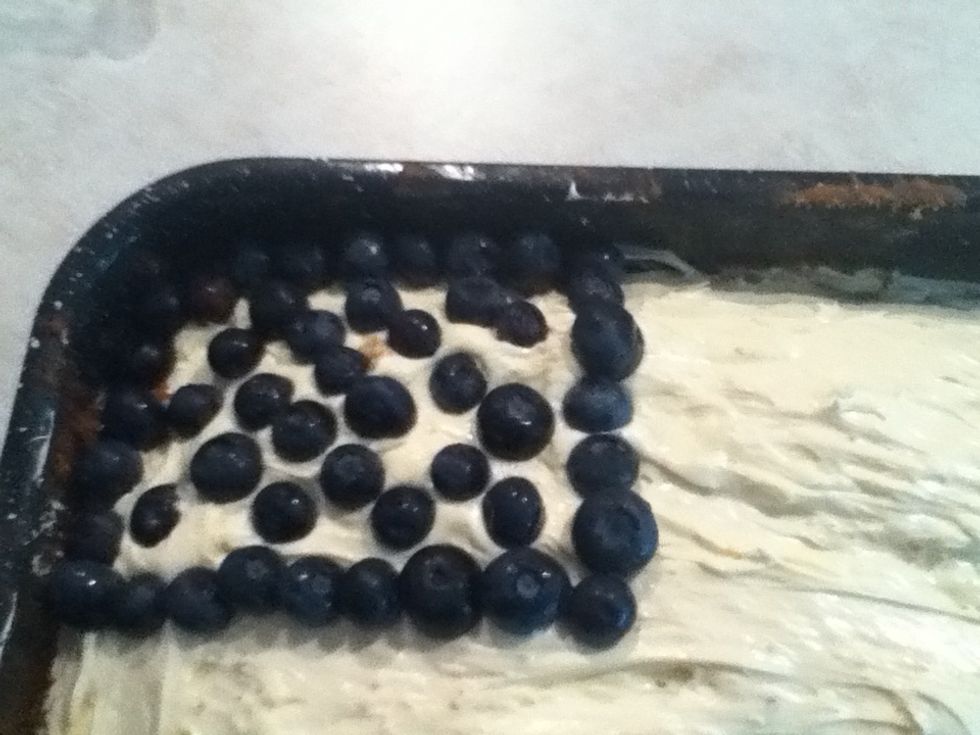 Take your blueberries and make them into a square at the corner :)