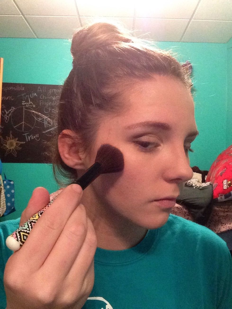 Take your blush brush coated in the product and spread onto the apple of your cheeks to your temple in a circular motion.