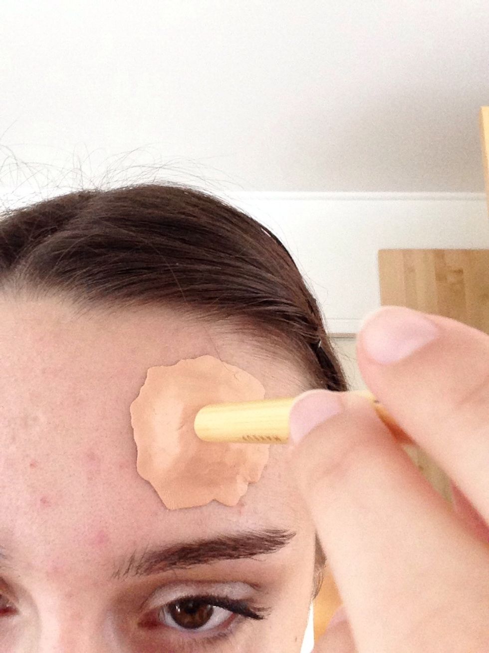 Take your brush and form a hole with it