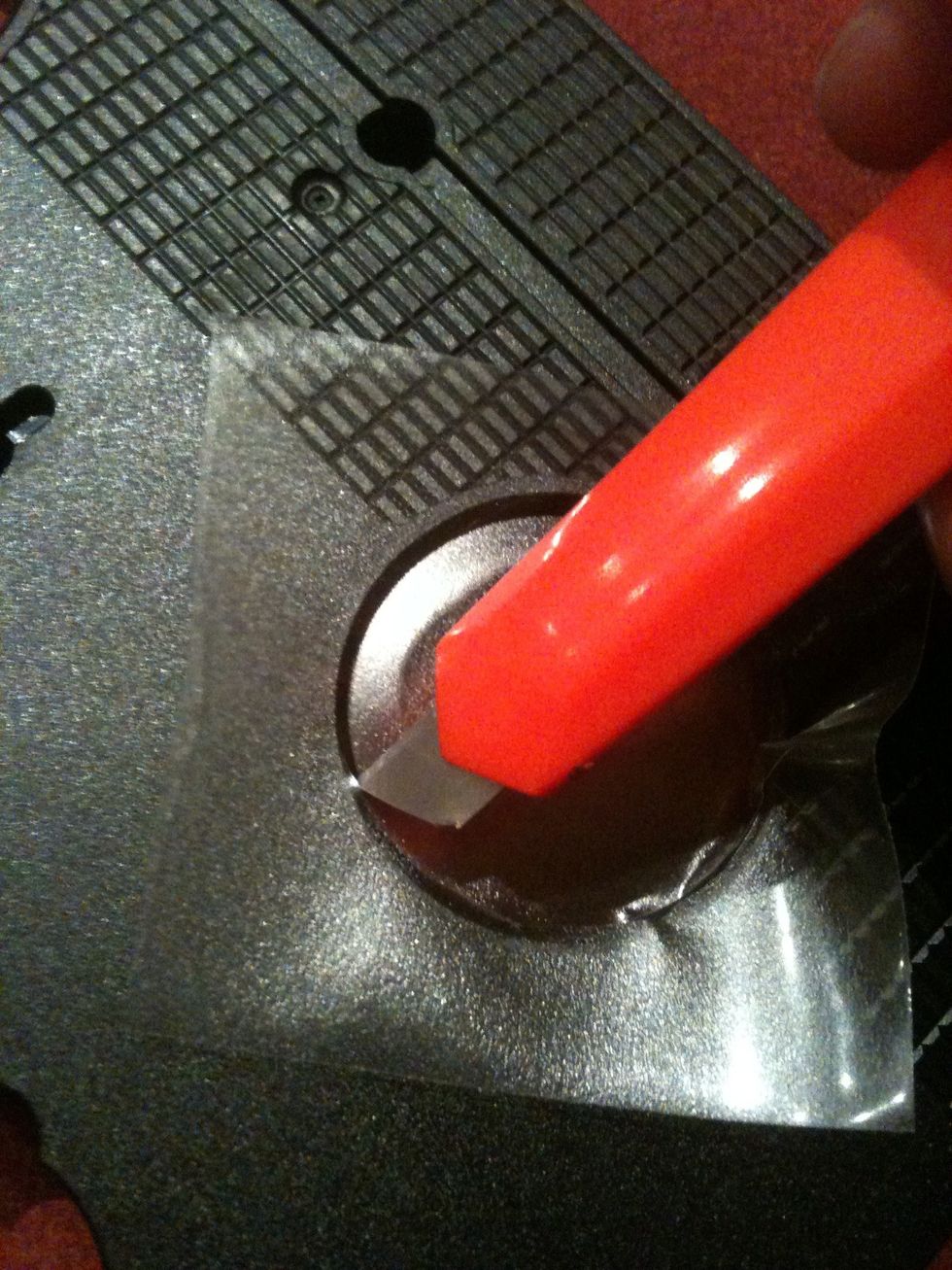 Take your carpet cutter and trim. Try to get an even edge. Then push the two layers together.