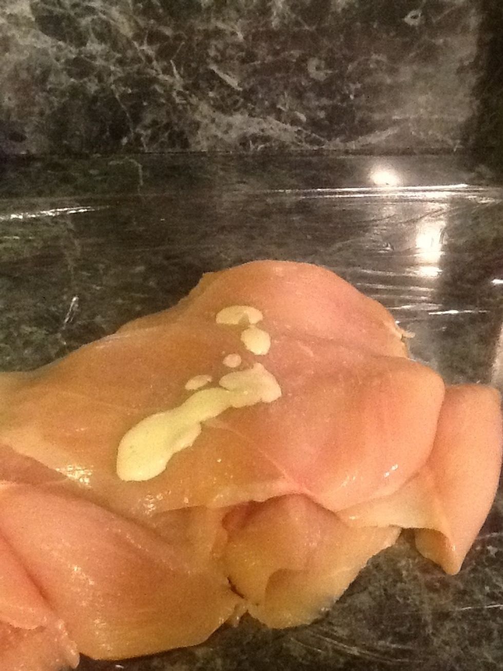 Take your chicken cutlet and season it with s/p and some Caesar dressing(trust me it will taste good) if you decide not to season it this way, you can season your chicken however you want,no biggy. :)