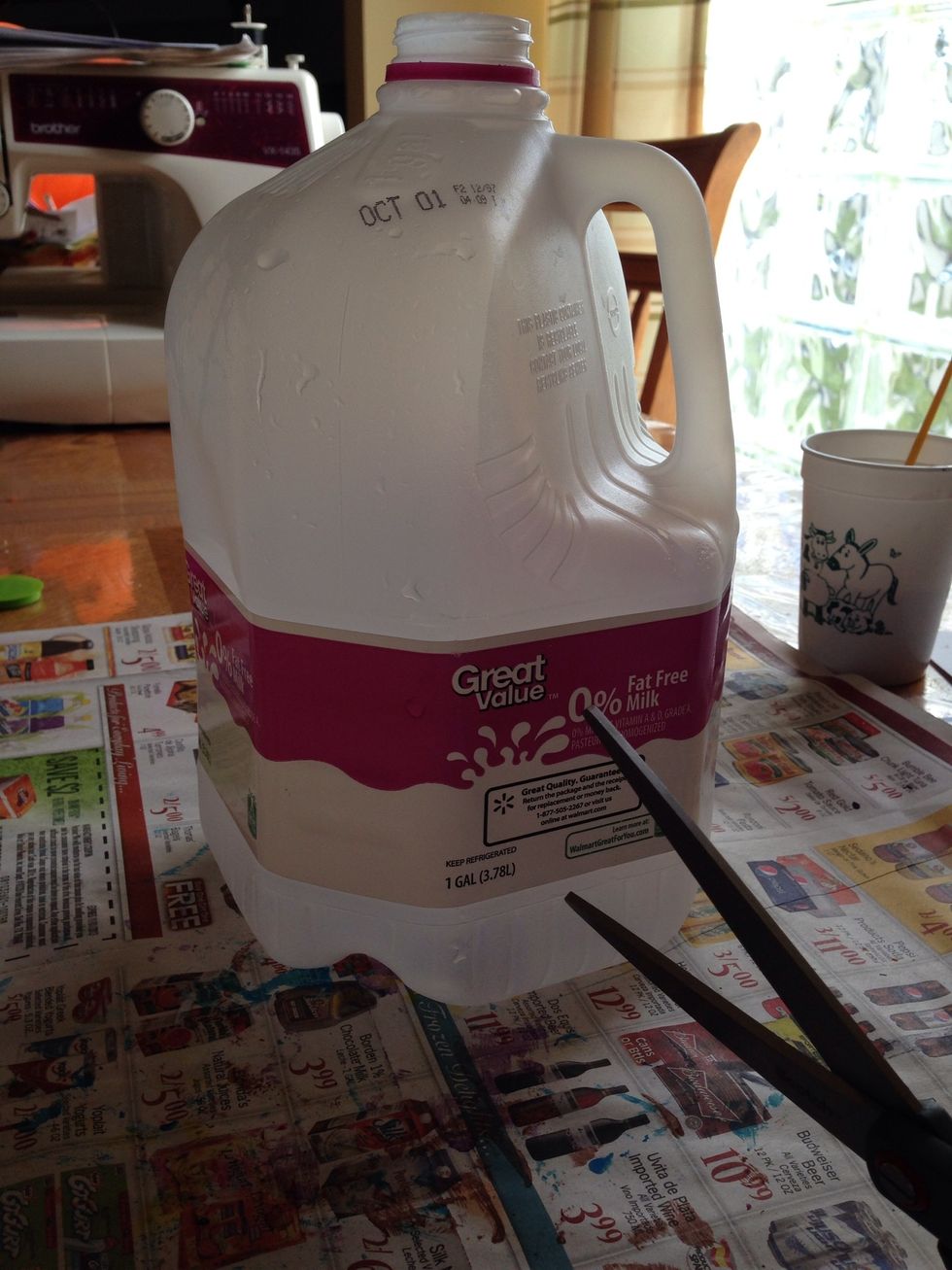 Take your clean milk or water jug and take the label off.
