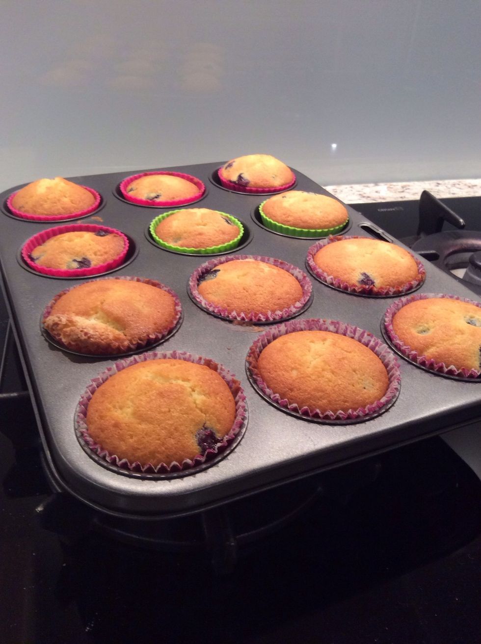 Take your cupcakes out of the oven and leave them to cool.