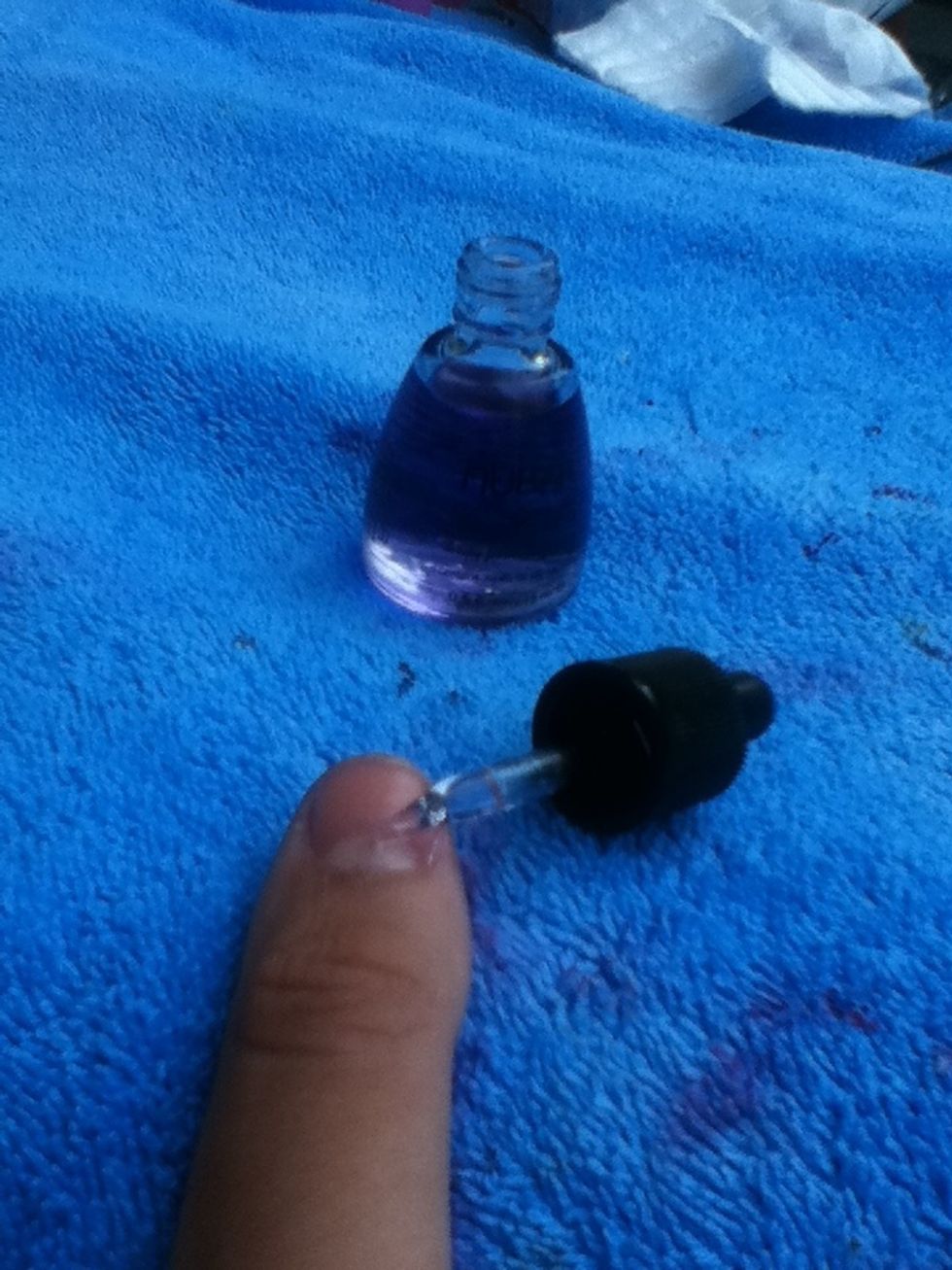 Take your cuticle oil and add a few drops.