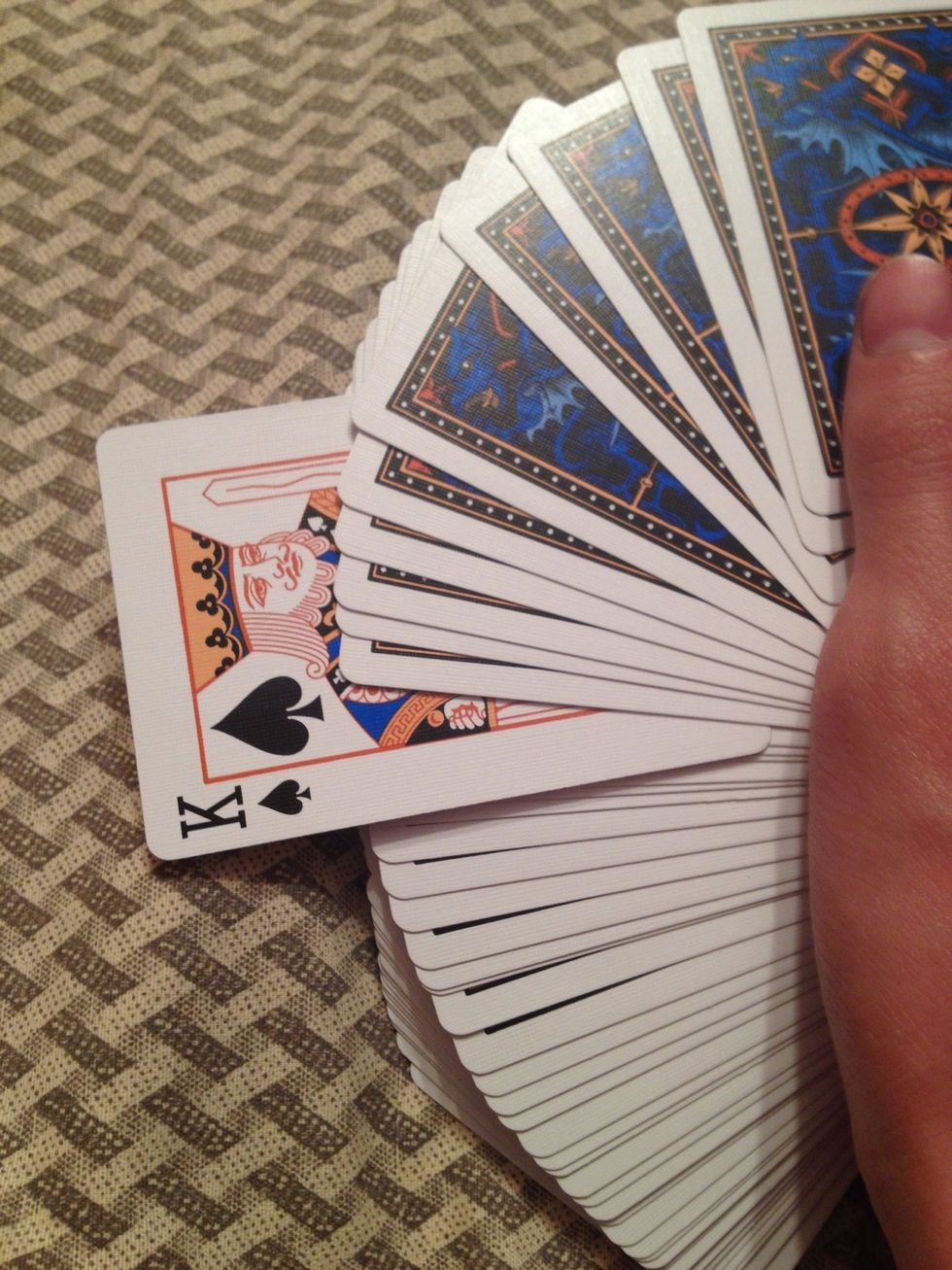 Take your deck of cards and have a spectator pick a card.