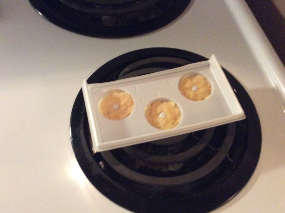 Take your donuts out of the microwave, they should be a little hot, leave to cool.\ud83d\udca8