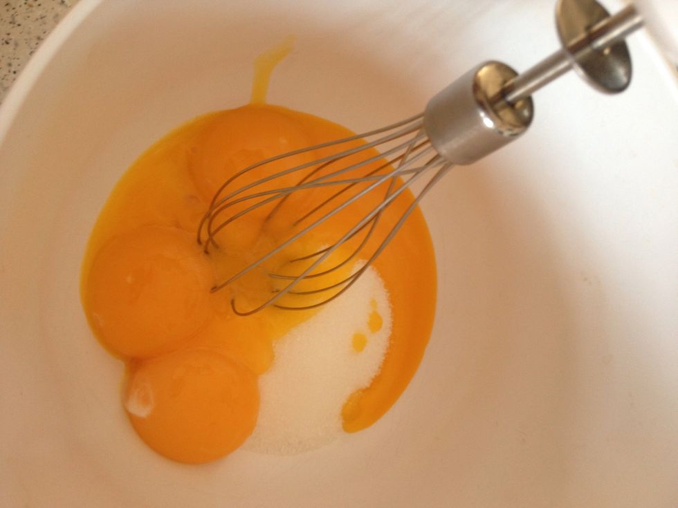 Take your egg yolk and mix it with the sugar.