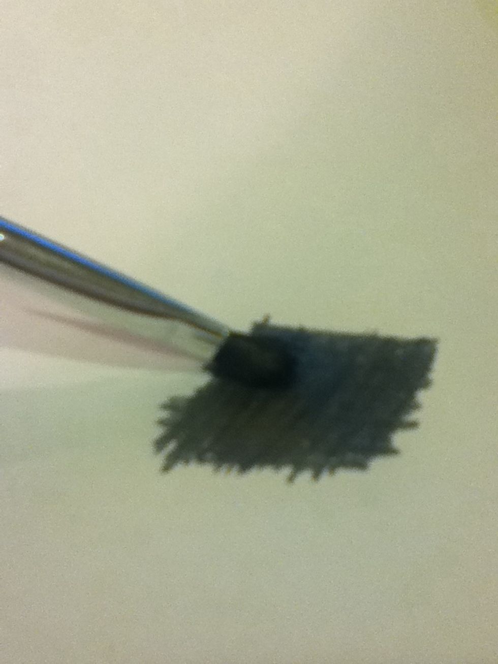 Take your F pencil and make a patch to rub your brush in...