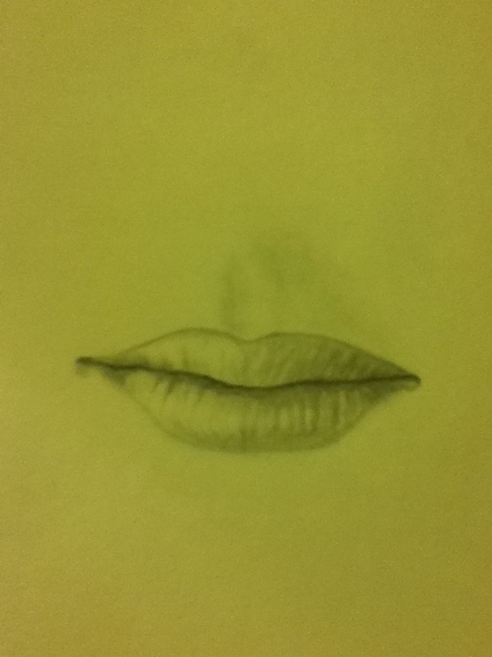 Take your F pencil and redraw the line in-between the two lips... I find that it turns out better if the line is dark and a little bit shaky because lips don't create a perfectly straight line:)