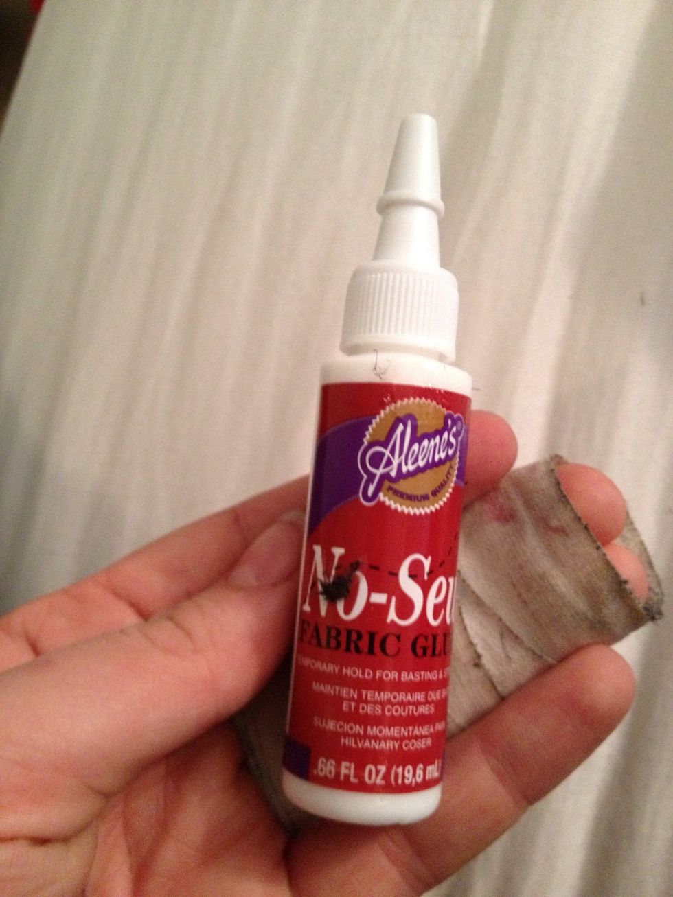 Take your fabric glue.