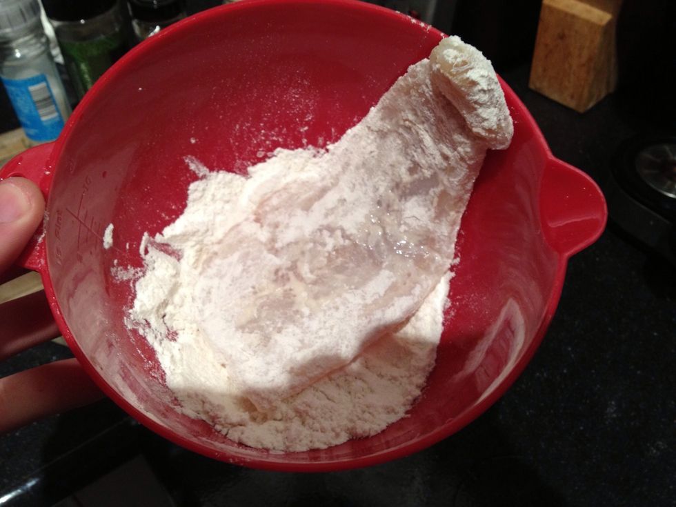 Take your fish and rub it down with some flour. It should naturally cling to the wet fish.