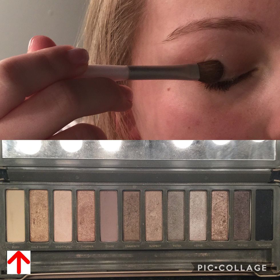 Take your flat eyeshadow brush and use "foxy" and put it just on your eyelid.