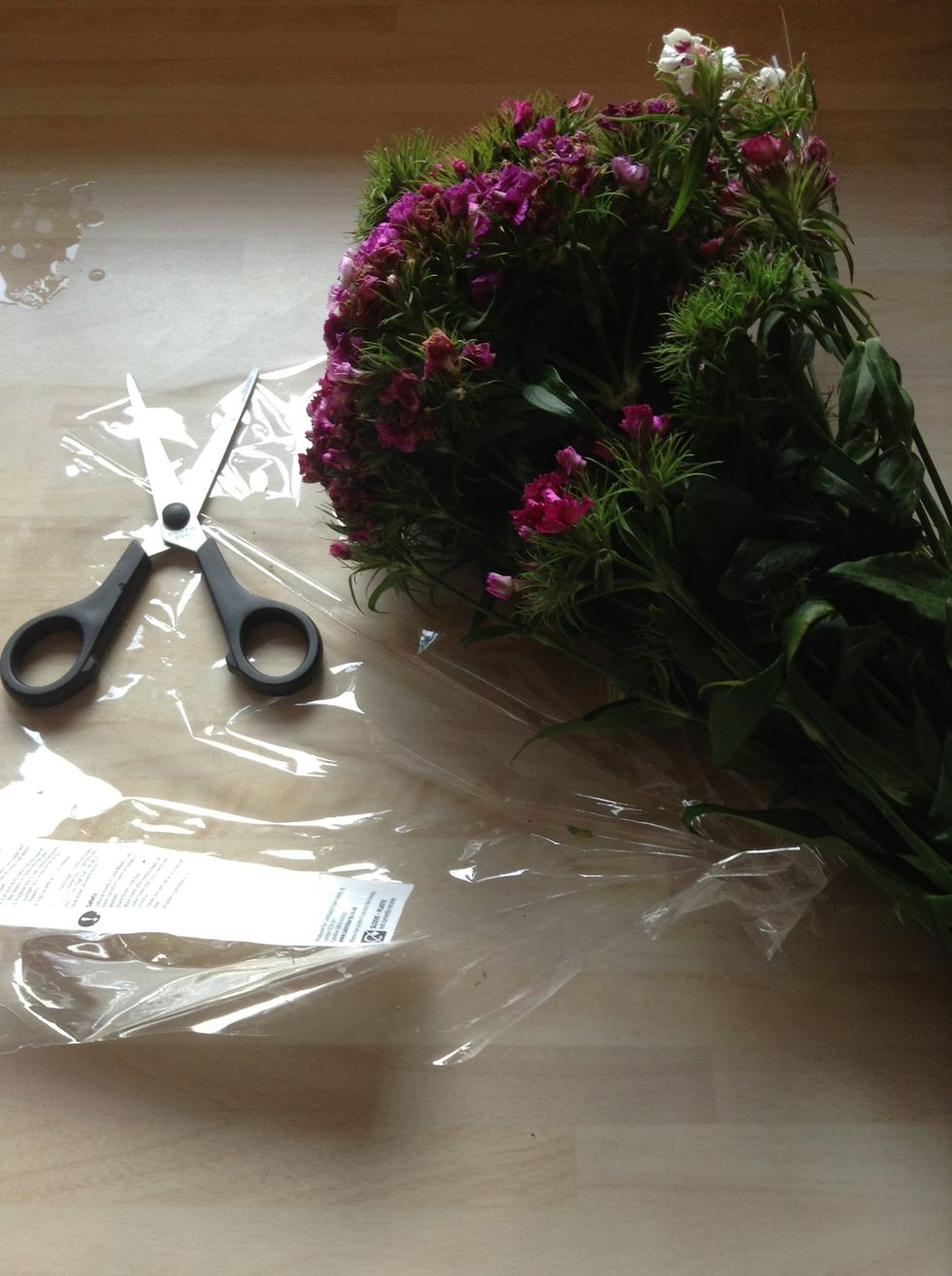 Take your flowers and chop to desired length for height of the jar.