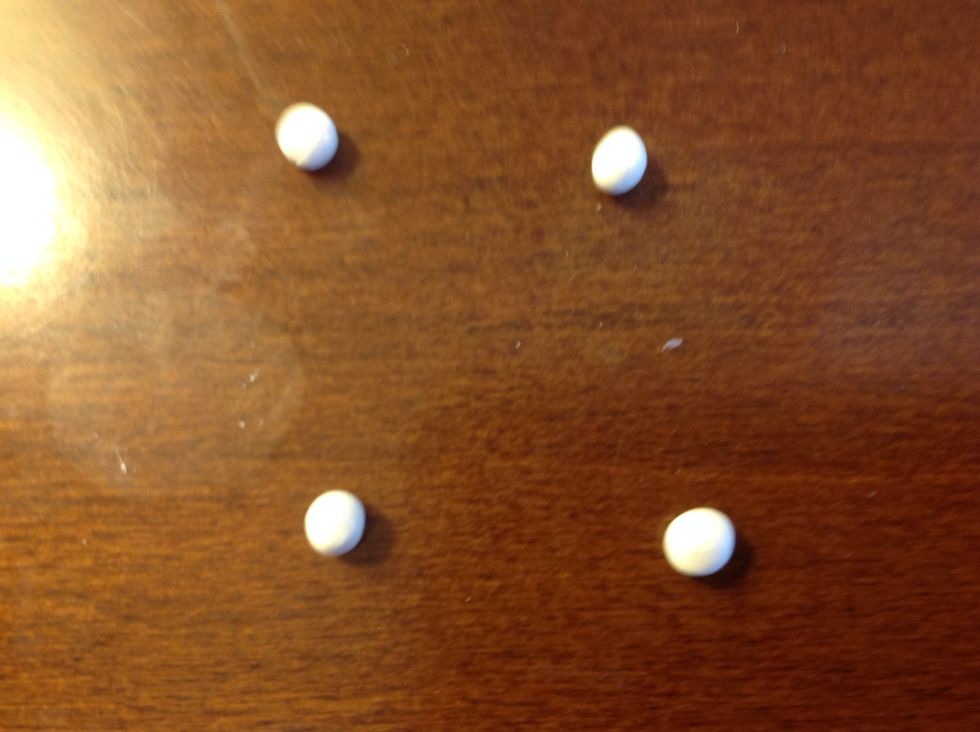 Take your four balls of clay.