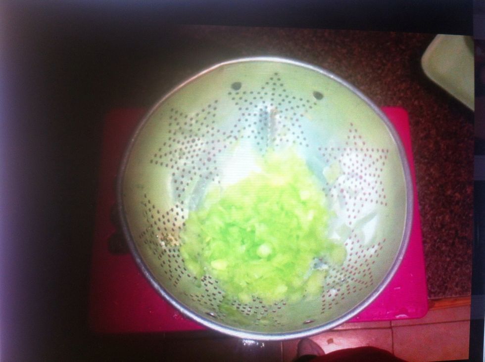 Take your halved cucumbers and peel away using a potato peeler. Drain cucumber very well! Or your dip will be watered down.