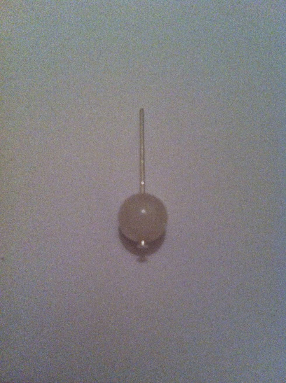 Take your head pin and thread your first bead