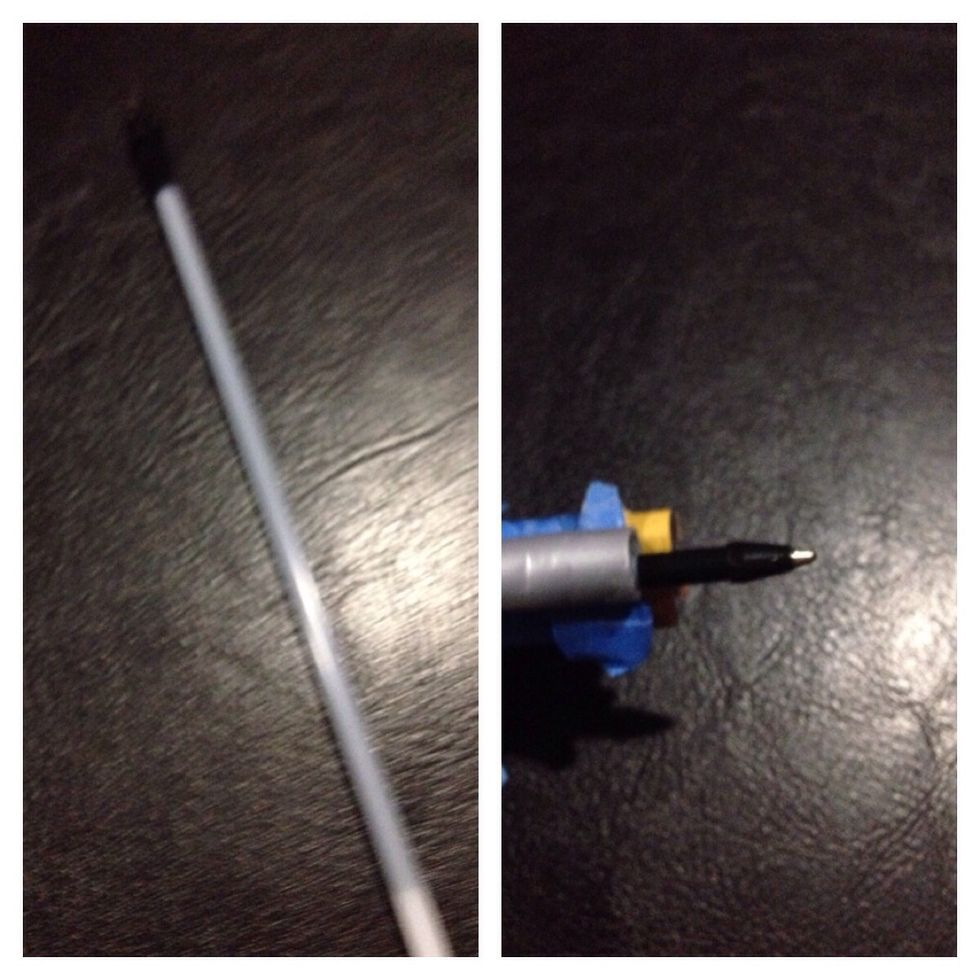 Take your ink cartridge or what ever projectile you decide to use and slide it in the end of the barrel that doesn't face you. The point will be facing out. Depending on what you use it may stick out.