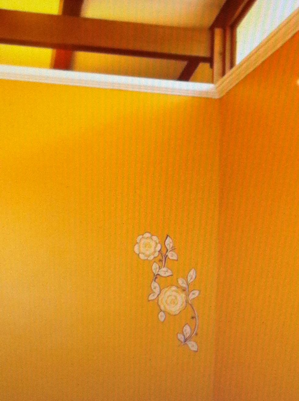 Take your iron and following the instructions for your fabric and the Heat N Bond, iron your fabric to the wall! Make sure to pellet off backer first!