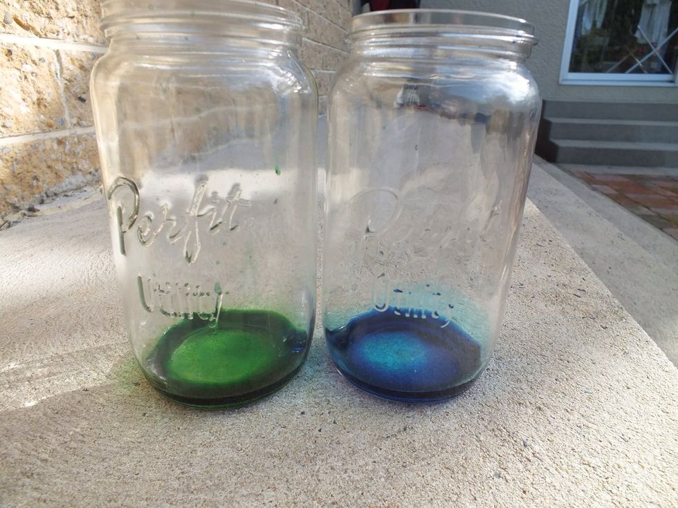 Take your jars and put your desired food colouring and water in.